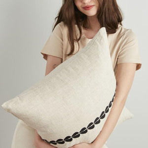 Embroidered pillow in natural color